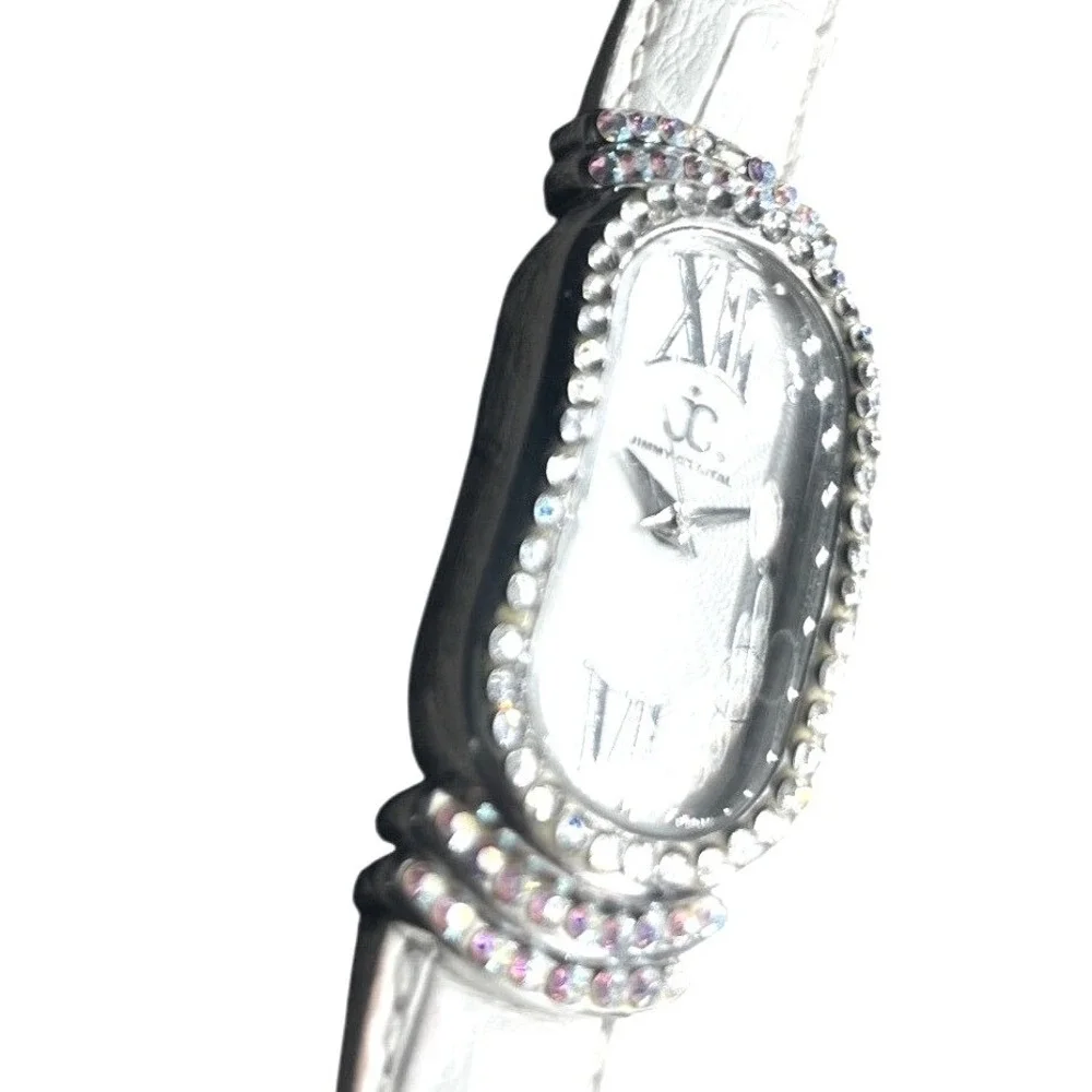 Jimmy Crystal Womens Oval Case Watch Rhinestone White Band Water Resistant WJ532